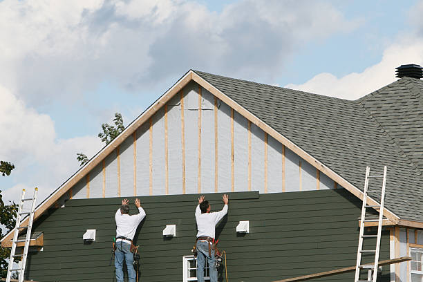 Professional Siding Contractor technician working in Lancaster, TX